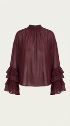 Burgundy sheer high mock-neck blouse with ruffle cuffs and voluminous bell sleeves