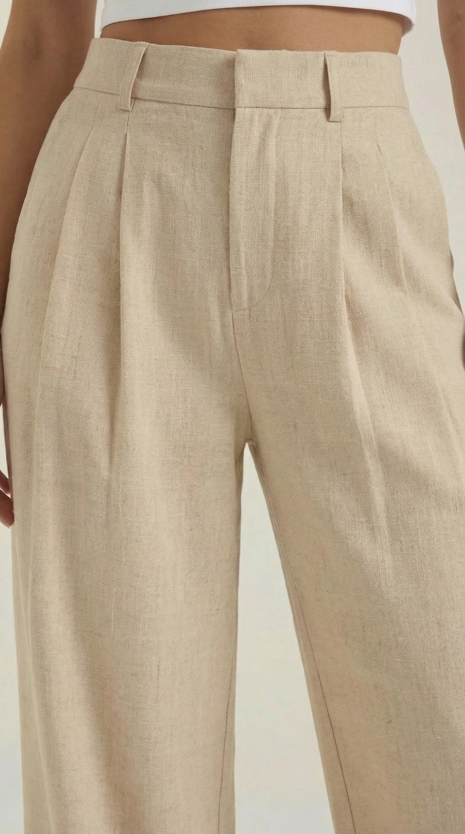 Women’s high-rise wide-leg pants in light beige with front pleats and pockets