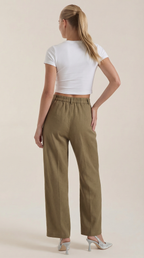Olive green pleated high-rise wide-leg pants with elastic waist and ankle-length legs