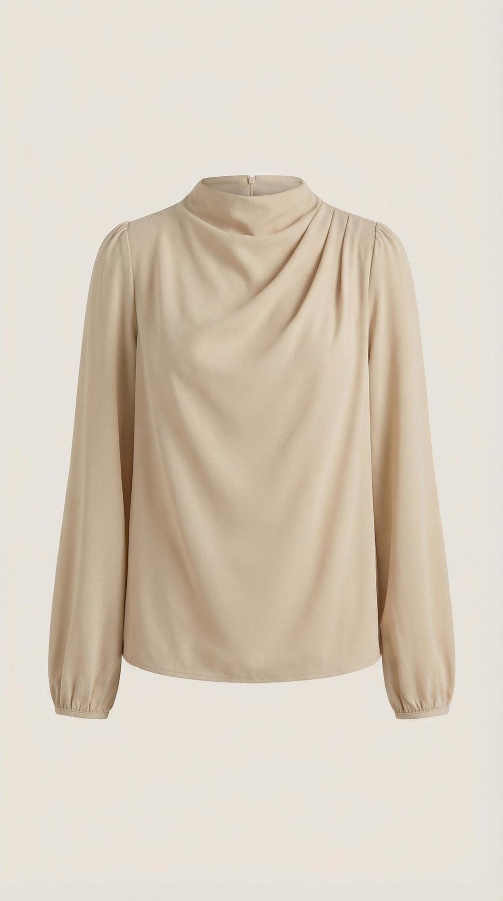 Beige draped long-sleeve blouse on mannequin with cowl neckline and puffed cuffs