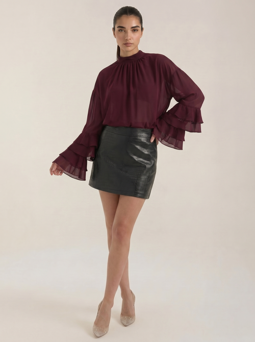 Burgundy sheer high mock-neck top with layered ruffle cuffs and billowy sleeves