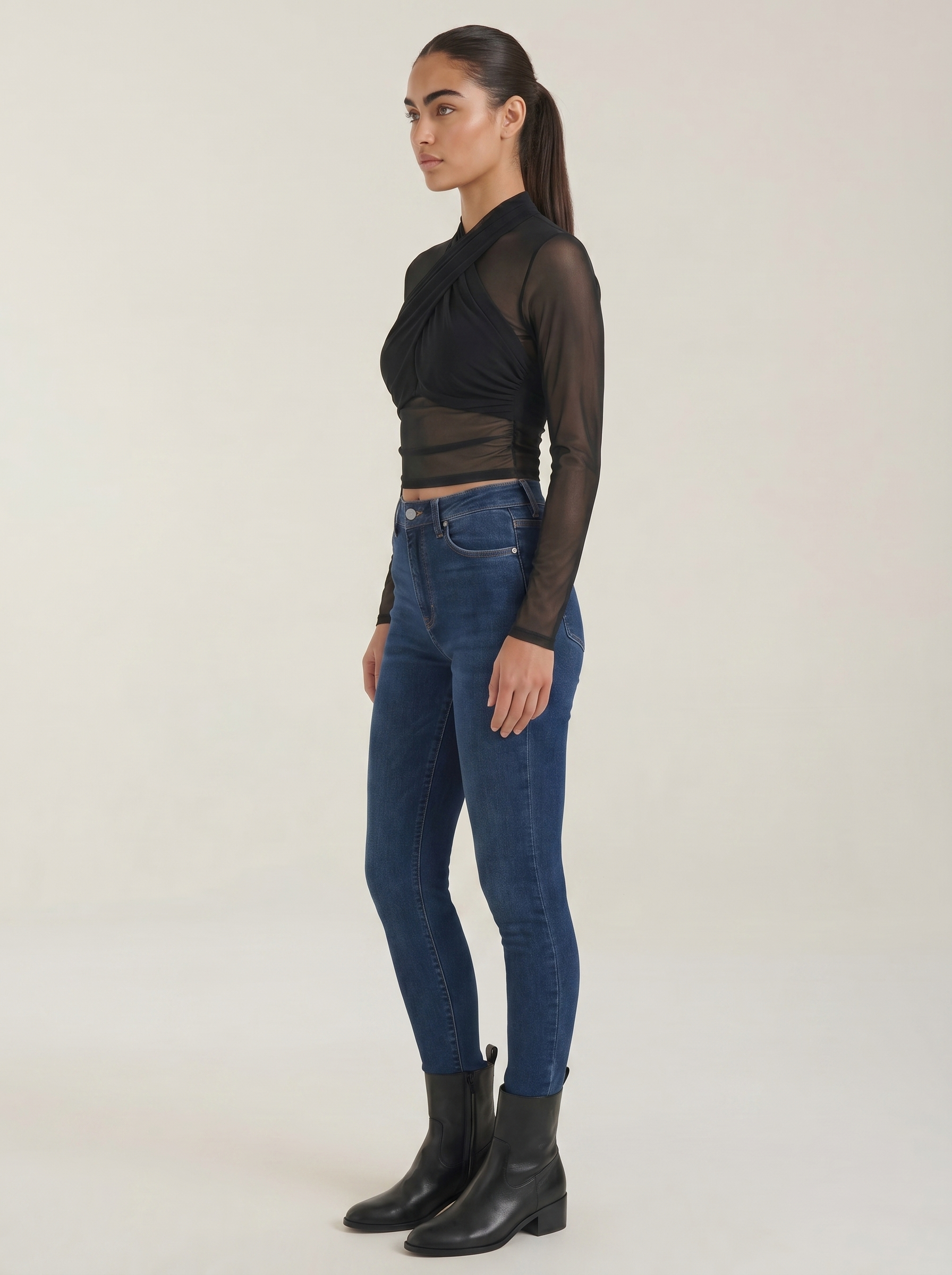 Black sheer wrap mesh top with long sleeves and cross wrap neckline