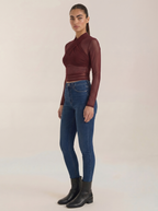 Burgundy sheer wrap mesh top with long sleeves and ruched cross wrap front
